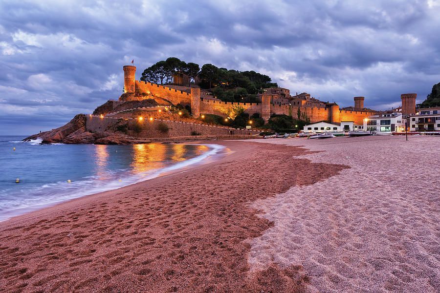 tossa-de-mar-at-dusk-in-spain-artur-bogacki-823415996.jpg